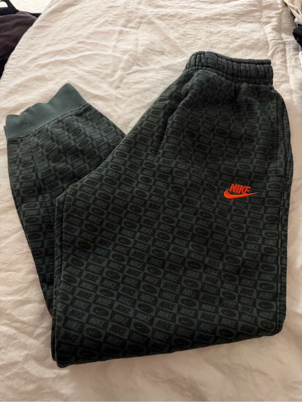 Nike Dark Green Allover Logo Joggers with Orange Swoosh